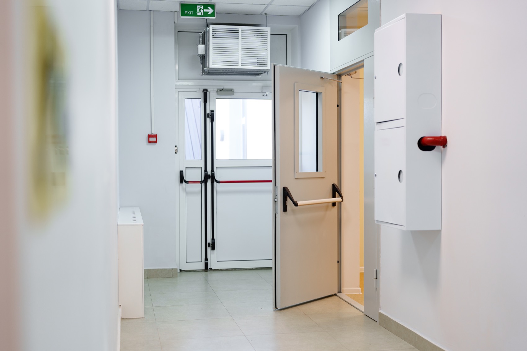 Commercial corridor with fire doors and escape route