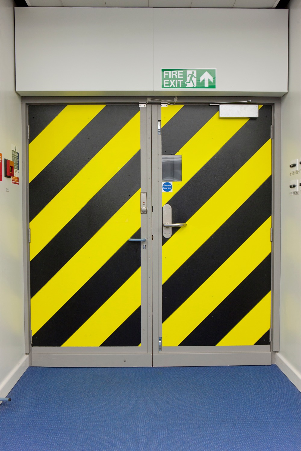 Industrial emergency exit door for regional fire door inspection services